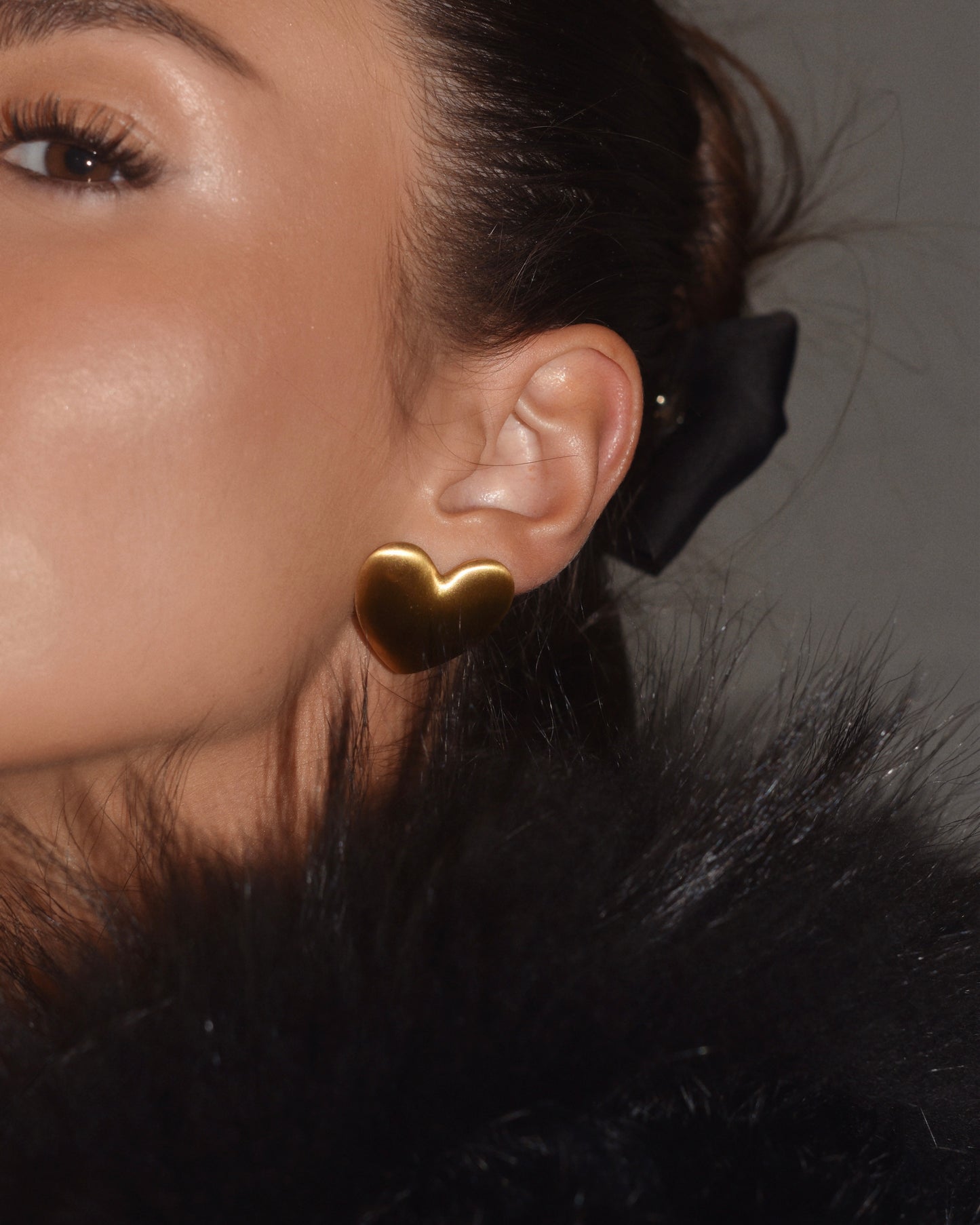 Model Bia Rebelo de Sousa wearing gold vintage inspired earrings handcrafted by lucky 13 jewelry