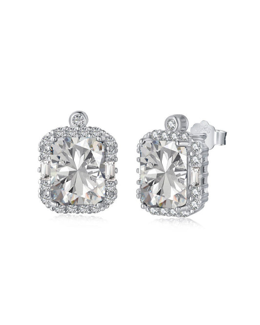 A pair of elegant VINTAGE DIAMOND STUDS by LUCKY13 featuring large, radiant-cut center stones set in 925 Sterling Silver settings with smaller surrounding diamonds. The hand-finished earrings have a subtle, decorative loop at the top and a secure stud backing.