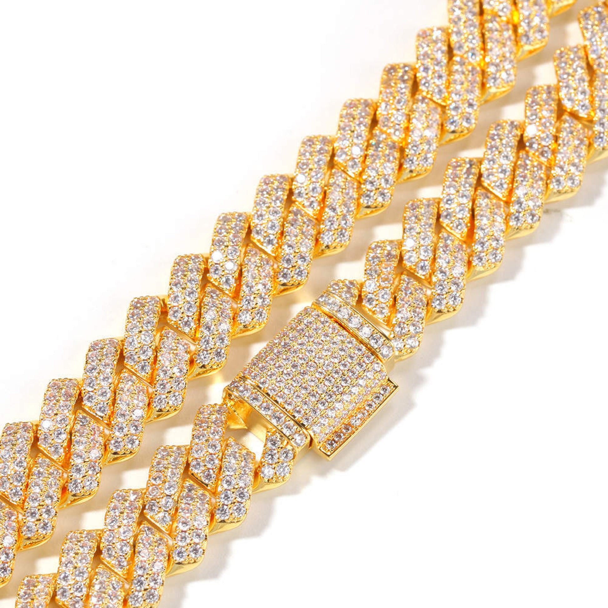 Close-up of a classic and sparkly Cuban Link chain bracelet in rhodium plating plating fully paved with cubic zirconias. Handcrafted by Lucky 13 jewelry.